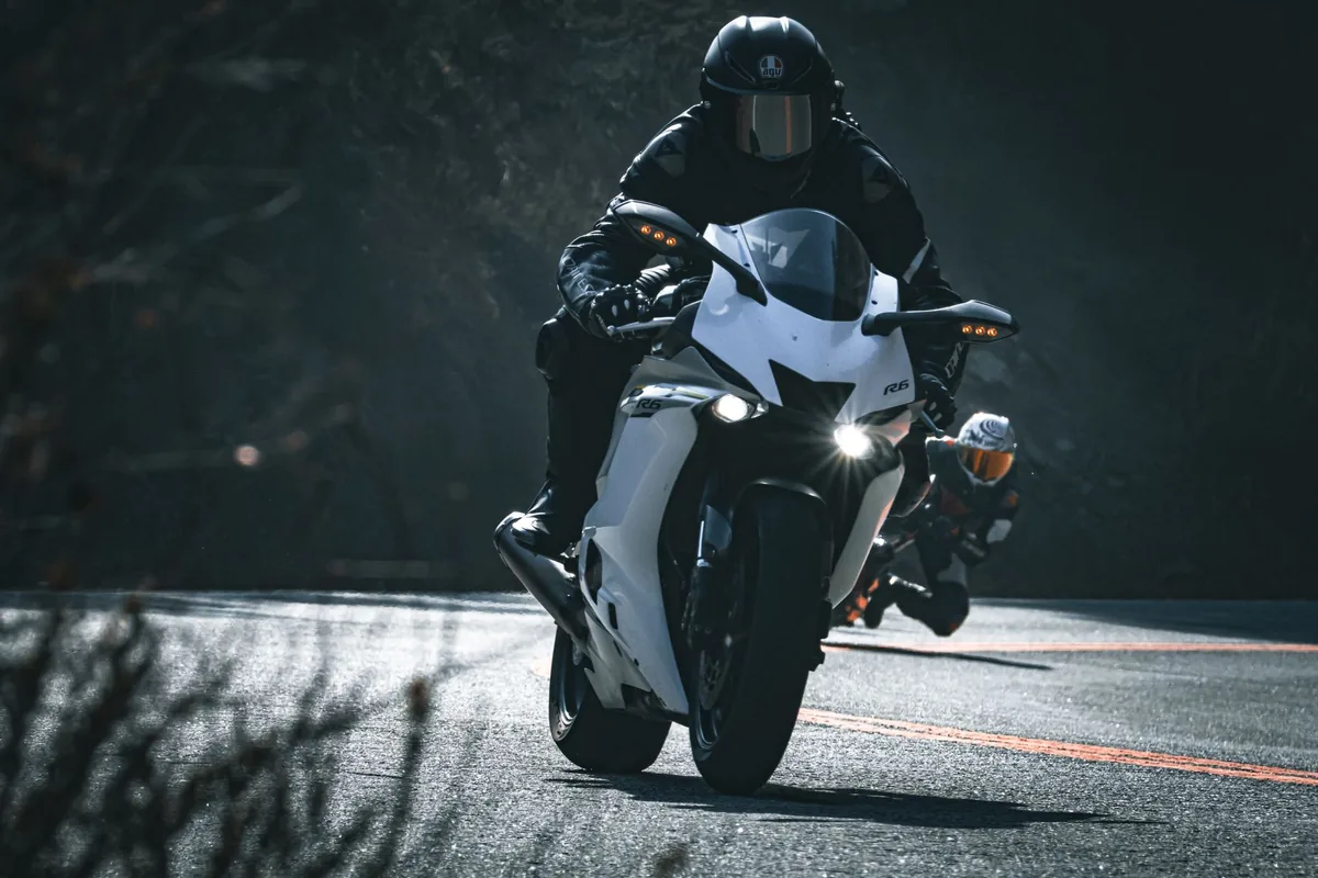 Fort Worth motorcycle accident lawyer: a rider in full gear on a sport bike travelling an open road